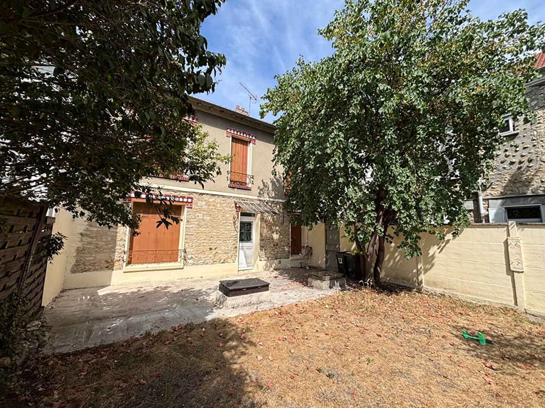 Maison chaleureuse avec jardin et cave