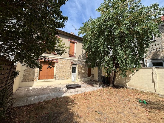 Maison chaleureuse avec jardin et cave
